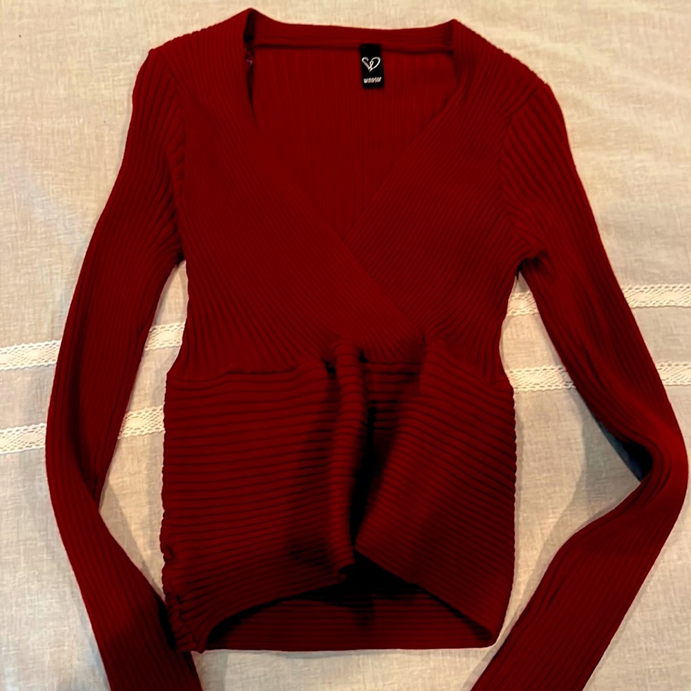 Red sweater in small and only worn once.